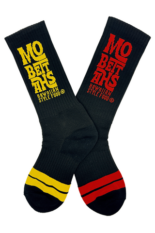 Black socks with yellow and red text and accents on a white background